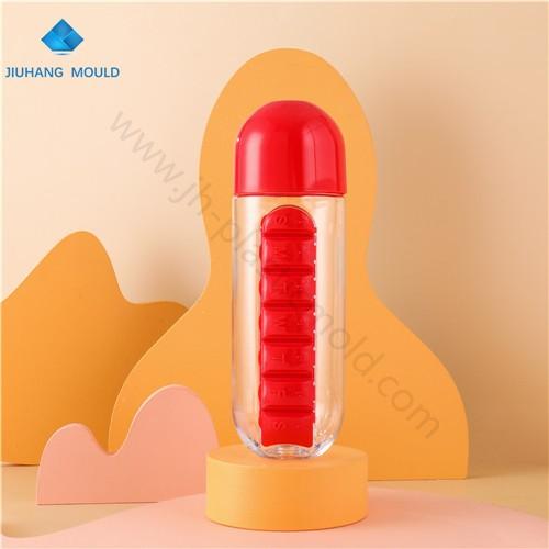 600ml Red plastic water bottle with organizer pill box compartments - Image 1