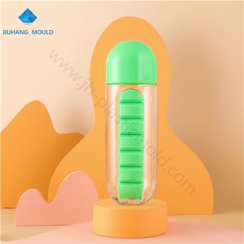 Plastic build-in pill organizer box medicine water bottle 600ML - Image 1
